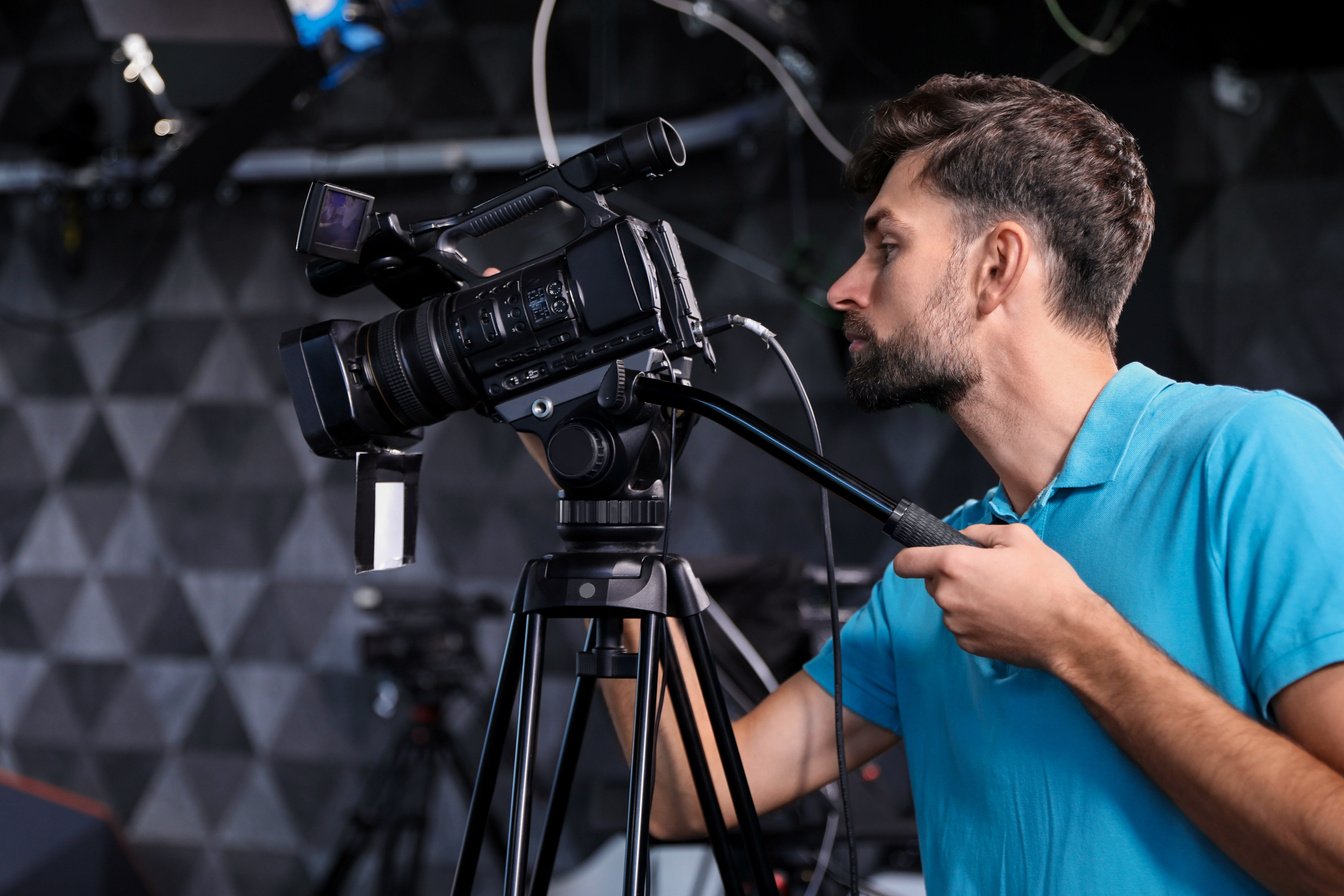 Professional Video Camera Operator Working in Studio